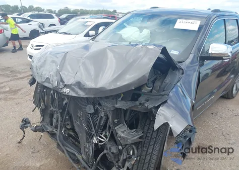 2014 Jeep Grand Cherokee Overland z USA, uszkodzony, nr VIN 1C4RJFCG6EC211600